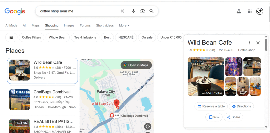 Google search results for “coffee shops near me” show Wild Bean Cafe, Chaibugs Dombivli, and Real Bites Patties, along with ratings, photos, and maps for local SEO.