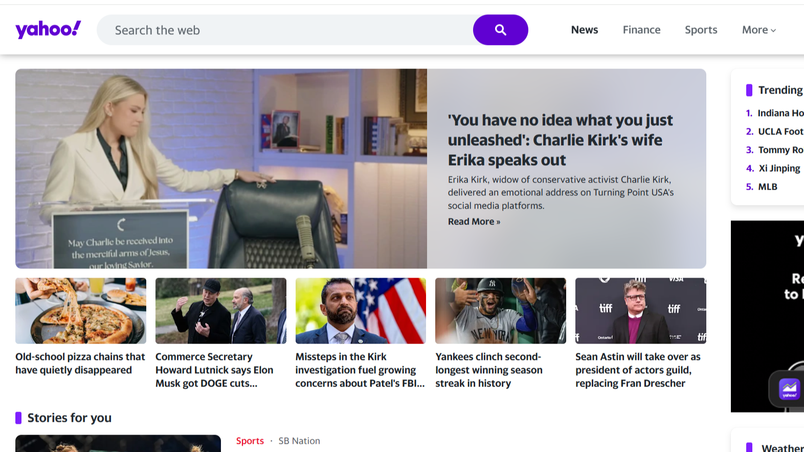 Yahoo Search Engine homepage displays trending news headlines, sports updates, and a web search interface.
