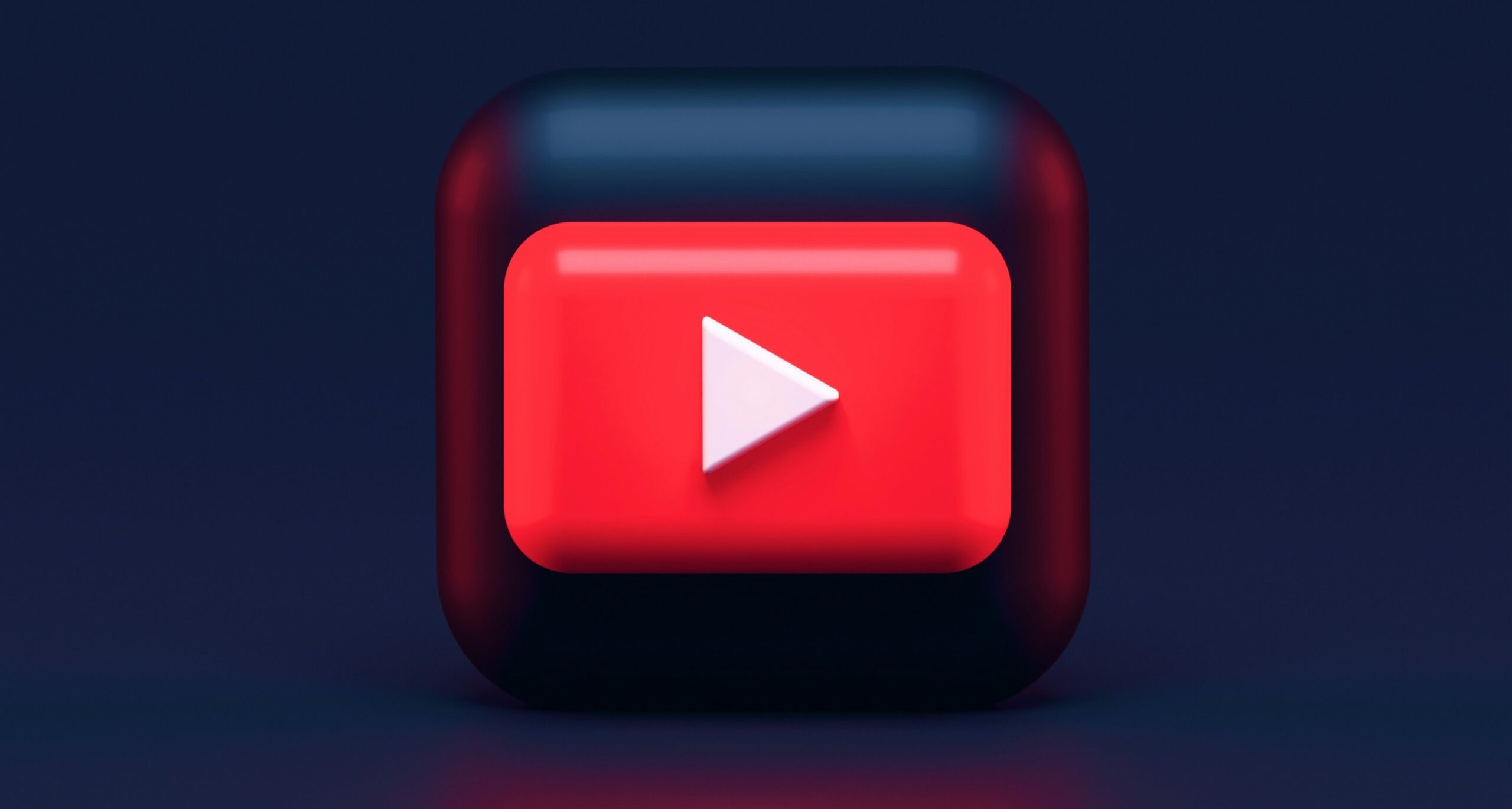 YouTube play button icon on a dark background, highlighting its status as a top search engine for video SEO optimization.